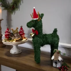 Northlight Reindeer With Santa Hat, Bell And Bow Artificial Pine Christmas Decoration - 16" -Christmas Decorations Store GUEST ae420e9d b2fc 49b5 8740 8bf48e7dd626